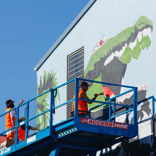 "The ‘Boxing Croc’ image, from Red Hand Prints, represents a time in the late 80’s when Franck's best mate’s mum owned a small takeaway shop at Humpty Doo. They would go and help out sometimes and imagine that the Boxing Croc was their own Territory version of Godzilla. In Japanese culture Godzilla was a metaphor for the USA and the fears of nuclear devastation brought on by the events at Hiroshima and Nagasaki. Also at that time American B-52 bombers were landing in Darwin for military exercises with undis