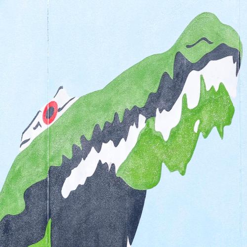 "The ‘Boxing Croc’ image, from Red Hand Prints, represents a time in the late 80’s when Franck's best mate’s mum owned a small takeaway shop at Humpty Doo. They would go and help out sometimes and imagine that the Boxing Croc was their own Territory version of Godzilla. In Japanese culture Godzilla was a metaphor for the USA and the fears of nuclear devastation brought on by the events at Hiroshima and Nagasaki. Also at that time American B-52 bombers were landing in Darwin for military exercises with undis